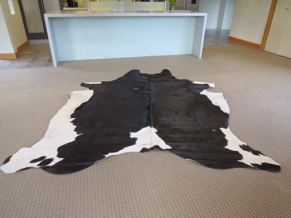 
            
                Load image into Gallery viewer, Large Cowhide - Black Brown + White
            
        
