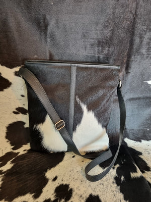 
            
                Load image into Gallery viewer, Cowhide Cross Body Handbag Black + White bold
            
        