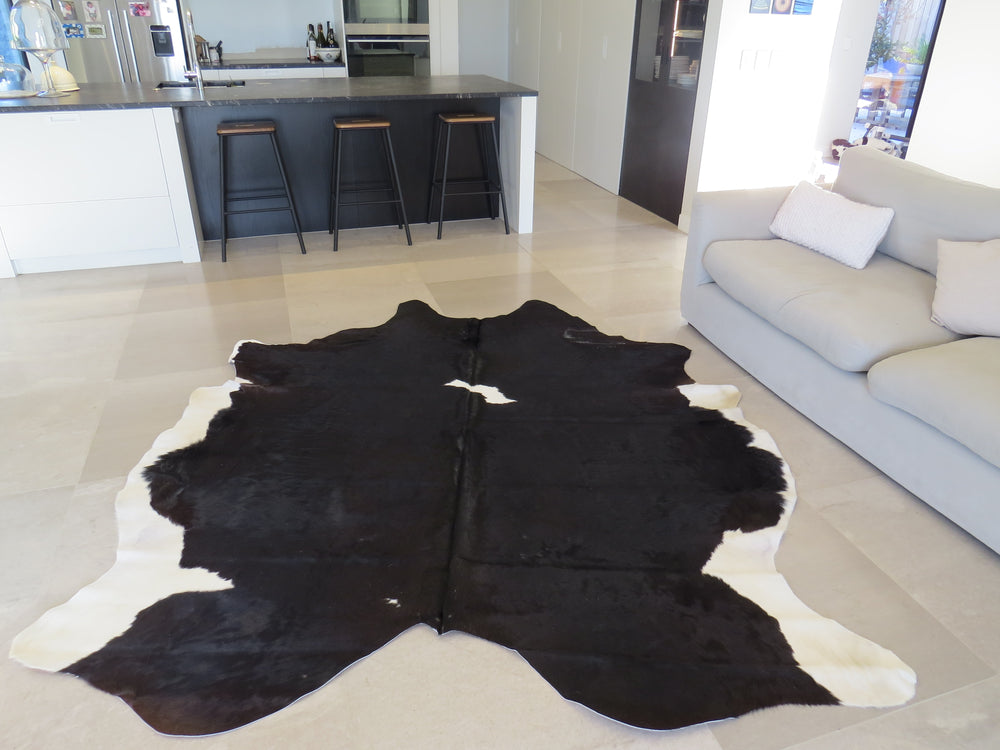 
            
                Load image into Gallery viewer, Large Cowhide - Black + White + Chocolate
            
        