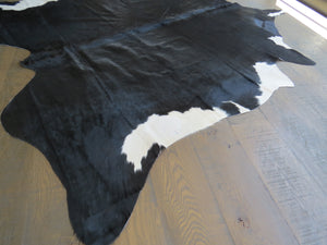 
            
                Load image into Gallery viewer, Large Cowhide - Black + White - Black Dominant
            
        