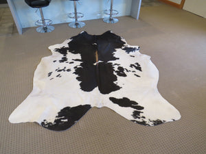 
            
                Load image into Gallery viewer, Large Cowhide - Black + White Brown Spine
            
        