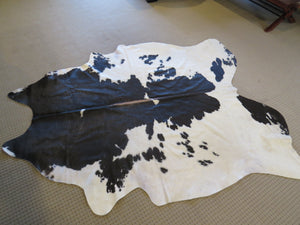 Large Cowhide - Black + White Brown Spine