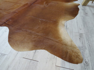 
            
                Load image into Gallery viewer, Large Cowhide - Dark Caramel
            
        