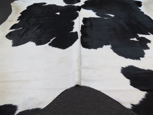 Super Cowhide Traditional Black + White fawn haunches