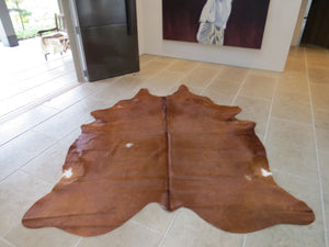 
            
                Load image into Gallery viewer, Large Cowhide - Toffee Brown
            
        