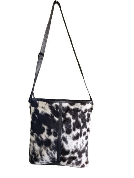 
            
                Load image into Gallery viewer, Cowhide Cross Body Handbag Black + White salt &amp;amp; pepper
            
        