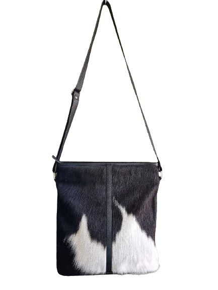 
            
                Load image into Gallery viewer, Cowhide Cross Body Handbag Black + White bold
            
        